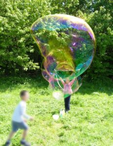 children making giant bubbles