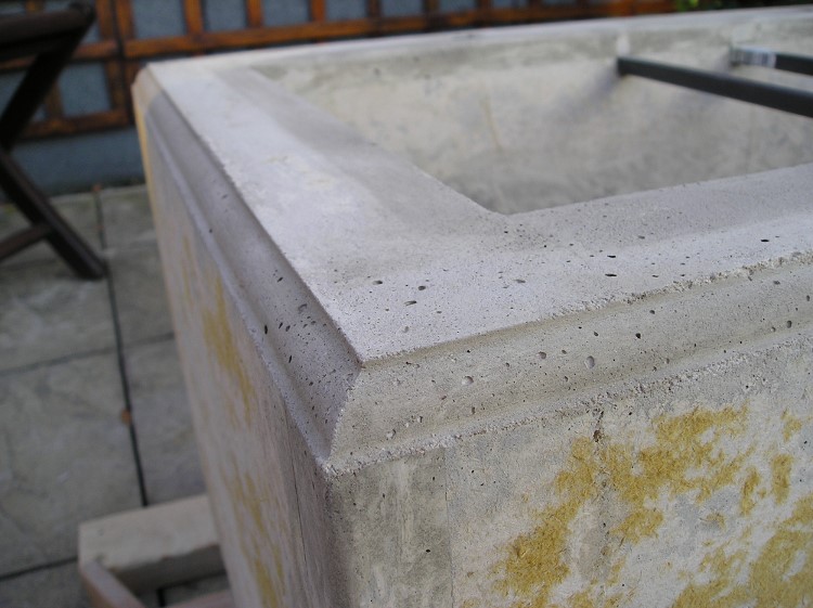 freshly cast fountain basin with mouldings